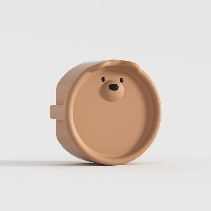 Cache-prise rotatif Ours — Protection bébé